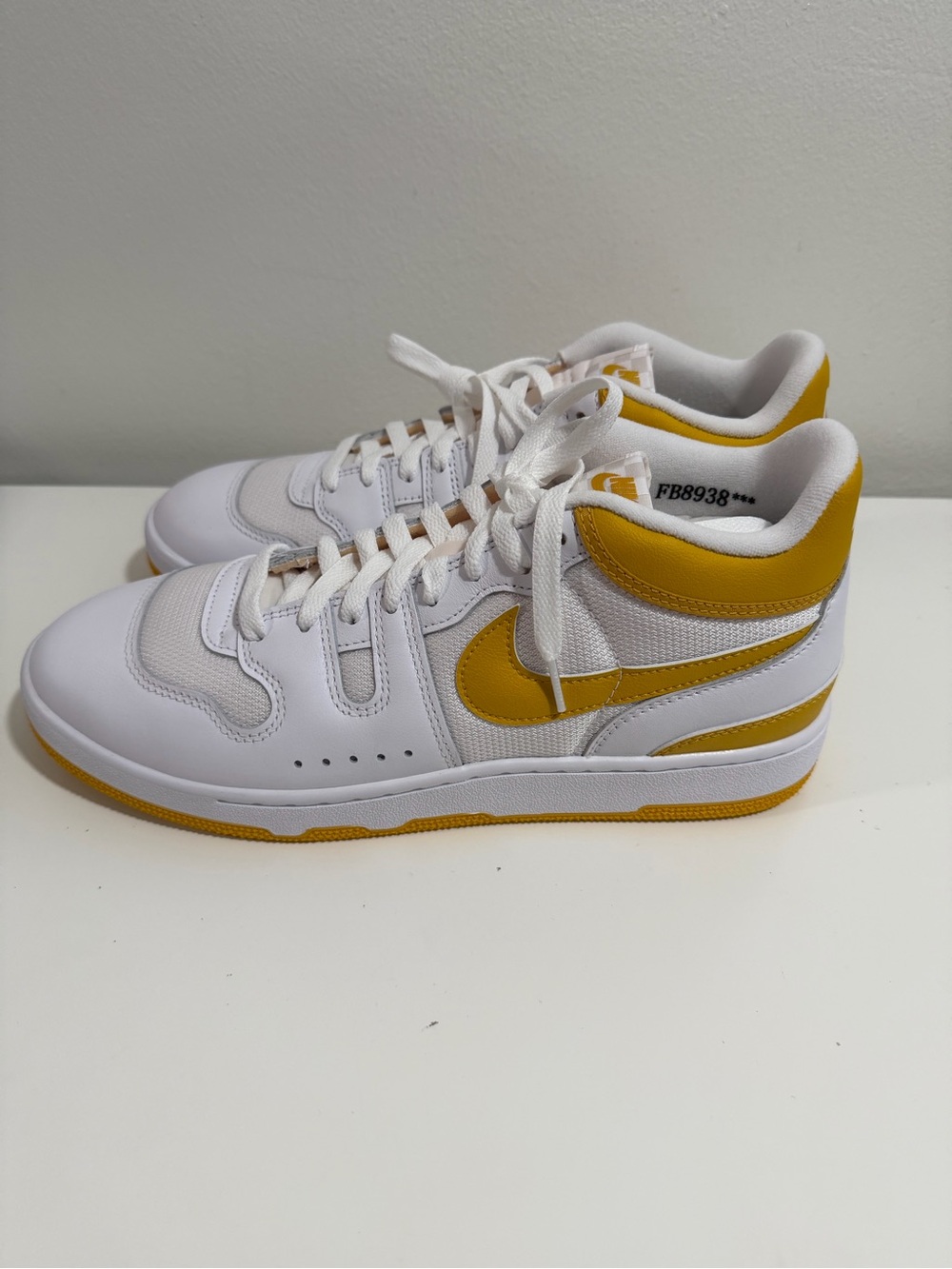 Nike White and Yellow Mid-Top Sneakers